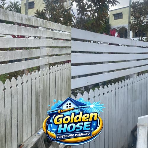 Before and after comparison of a dirty white fence restored by professional pressure washing.